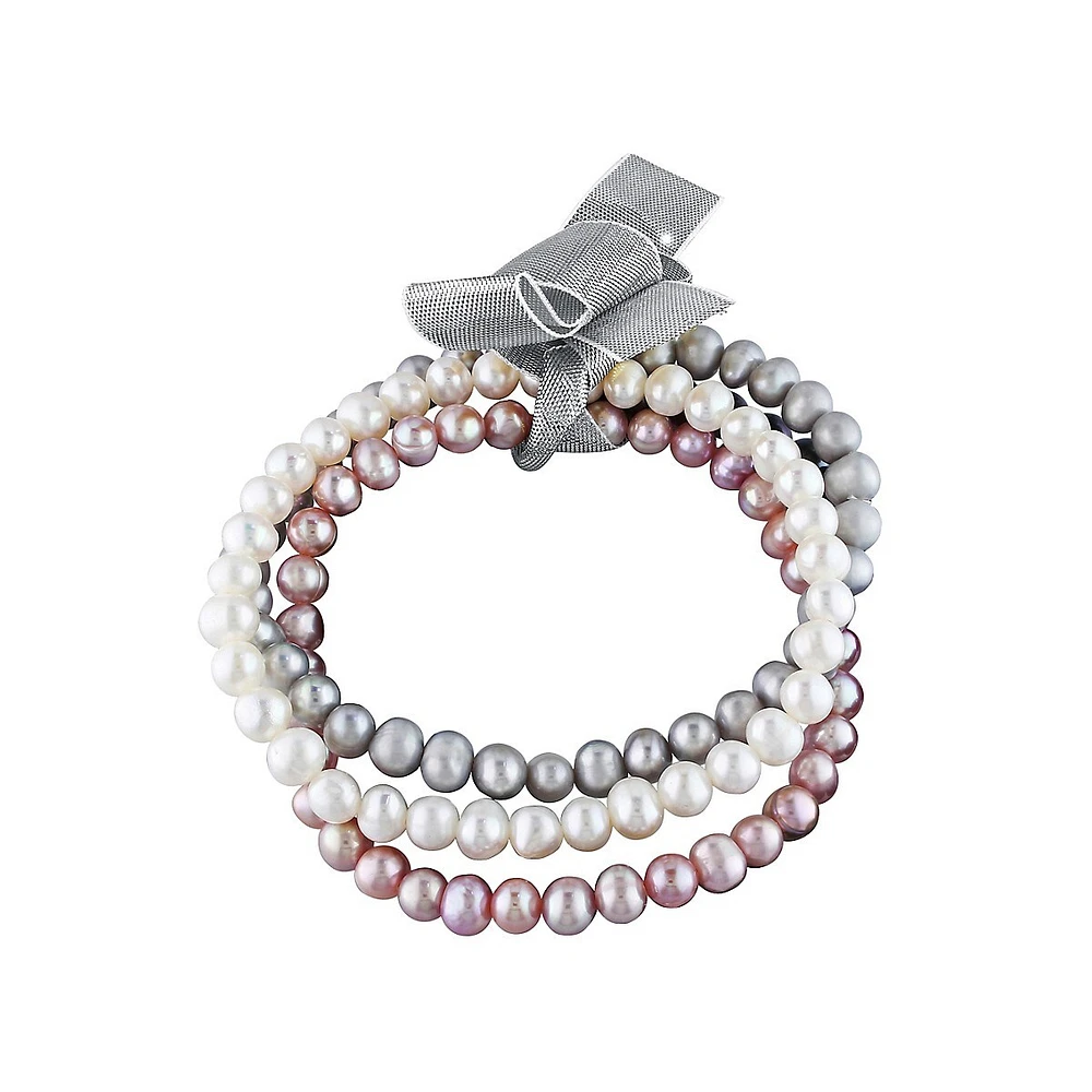 Ce superbe ensemble de trois bracelets extensibles comprend des perles d'eau douce de culture roses, grises et blanches et est offert avec un ruban gris pour offrir des cadeaux.