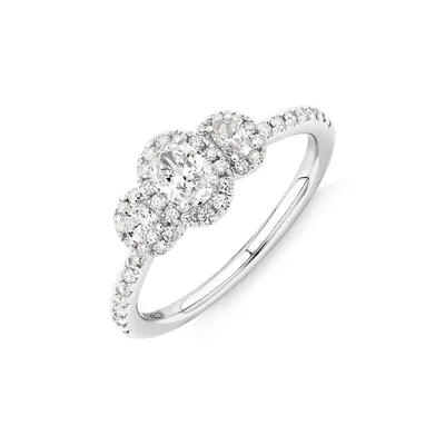 0.77 Carat Tw Three Stone Oval Cut Halo Engagement Ring In 14kt White Gold