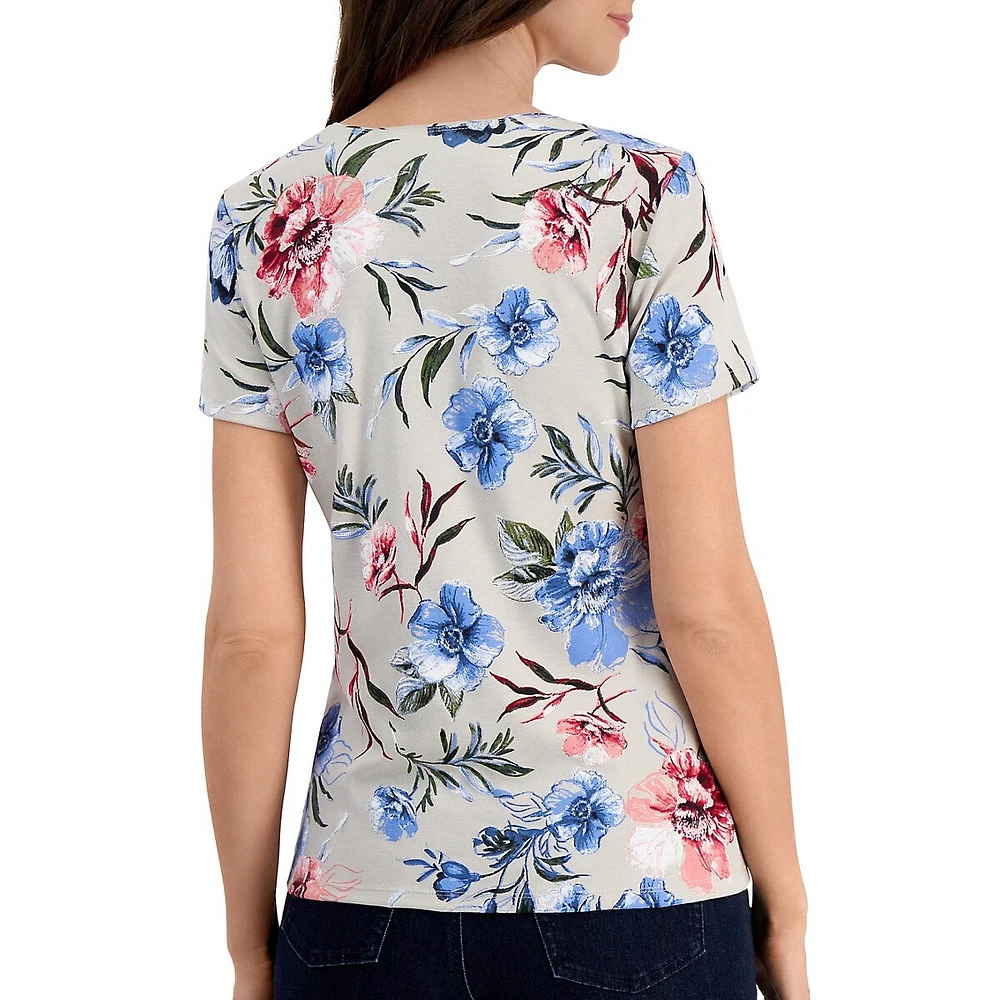 Haut à manches courtes et motif de fleurs balayées par le vent