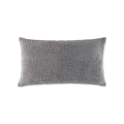 Coussin décoratif bouclé