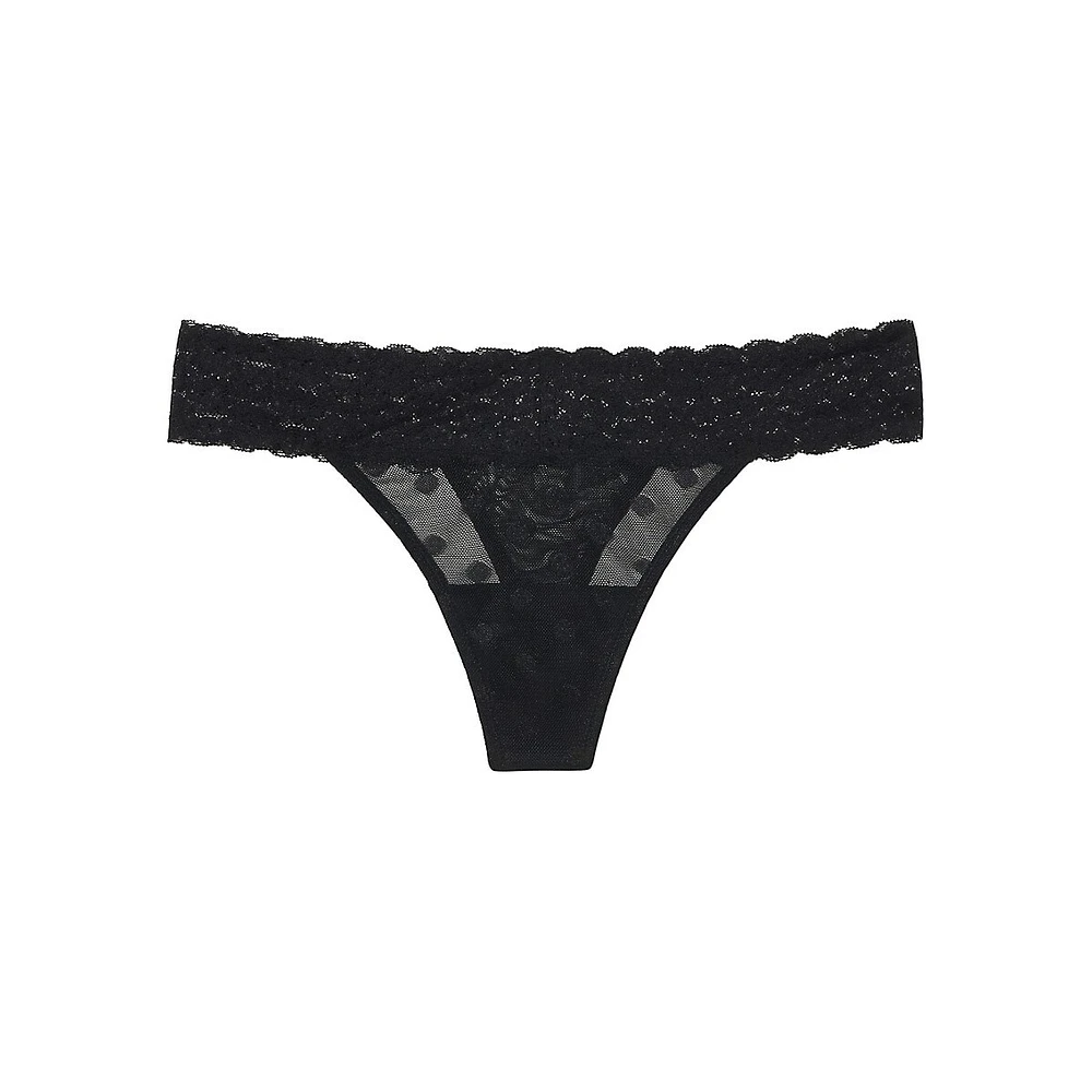 Tanga en dentelle semi-diaphane Dare