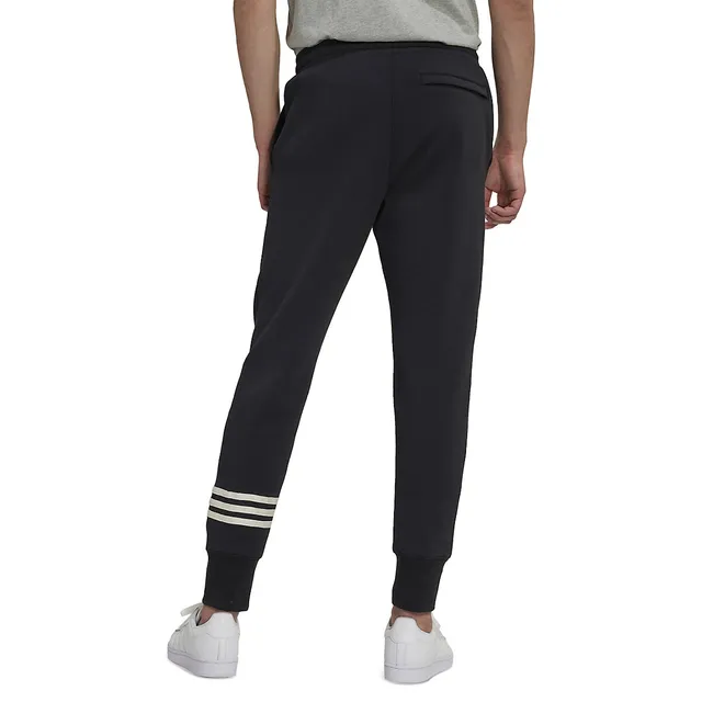 In motion.# Adidas Tiro pants are essential this season.