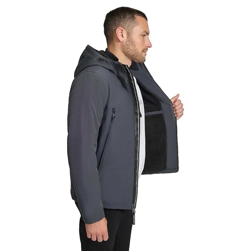 Veste softshell à capuche doublée de fausse peau mouton