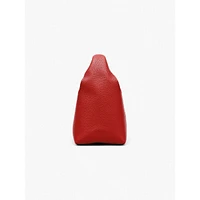 Le sac à bandoulière en cuir