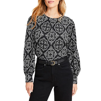 Blouse texturée à manches bouffantes et motifs de tuiles