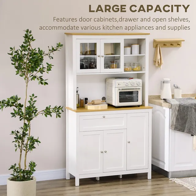 File:White kitchen with cabinet doors and drawers opened or