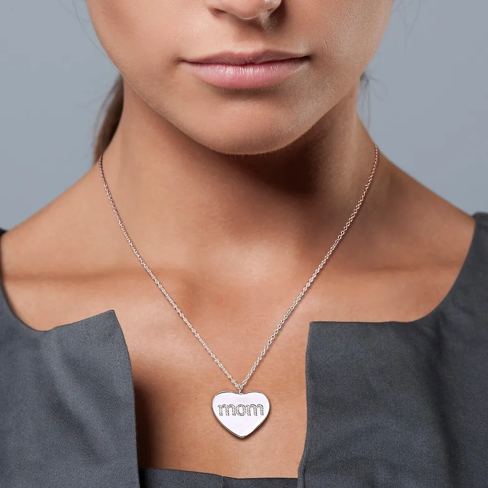 1/10 Ct Tw Diamond 'mom' Engraved Heart Necklace In Sterling Silver