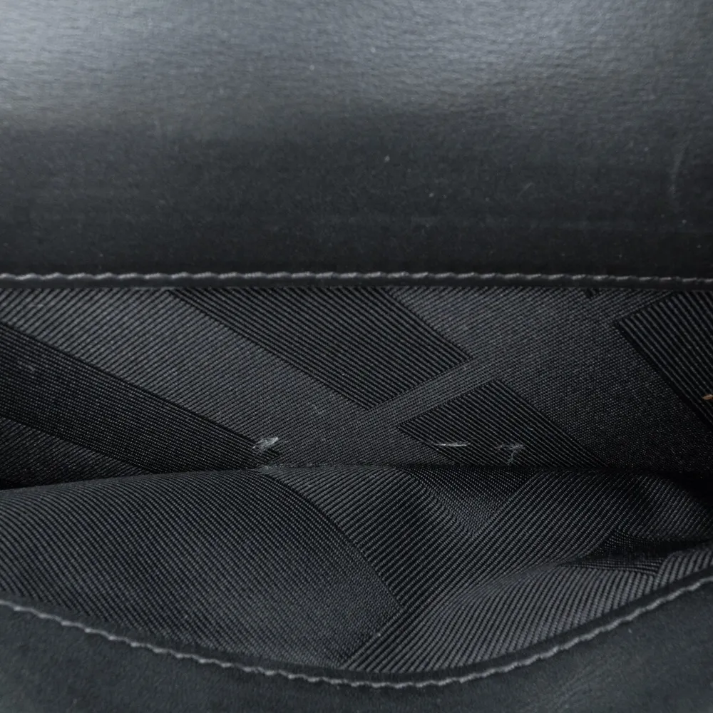 Pre-loved Embossed Leather Long Wallet