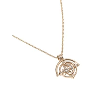 Goldtone & Crystal Moon & Star Spinner Necklace