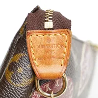 Louis Vuitton Mini Monogram Patch Pochette Accessoires