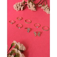 Set Of 8 Gold-plated White Stone-studded Finger Rings