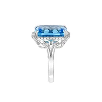 Bague en or blanc 14 ct avec topaze bleue et diamants de 0,28 ct (PT)