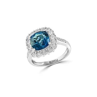 Sterling Silver, Long Blue Topaz & 0.24 CT. T.W. Diamond Halo Ring