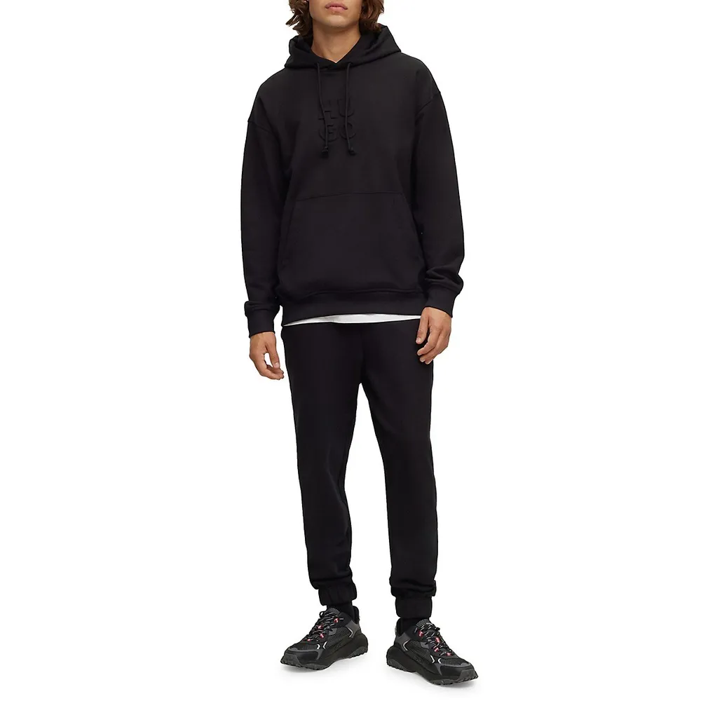 Relaxed Stacked Embossed Logo Trackpants