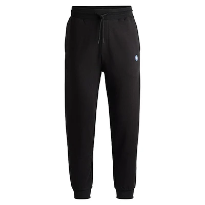Cotton-Terry Track Pants With Smiley-Face Logo Patch
