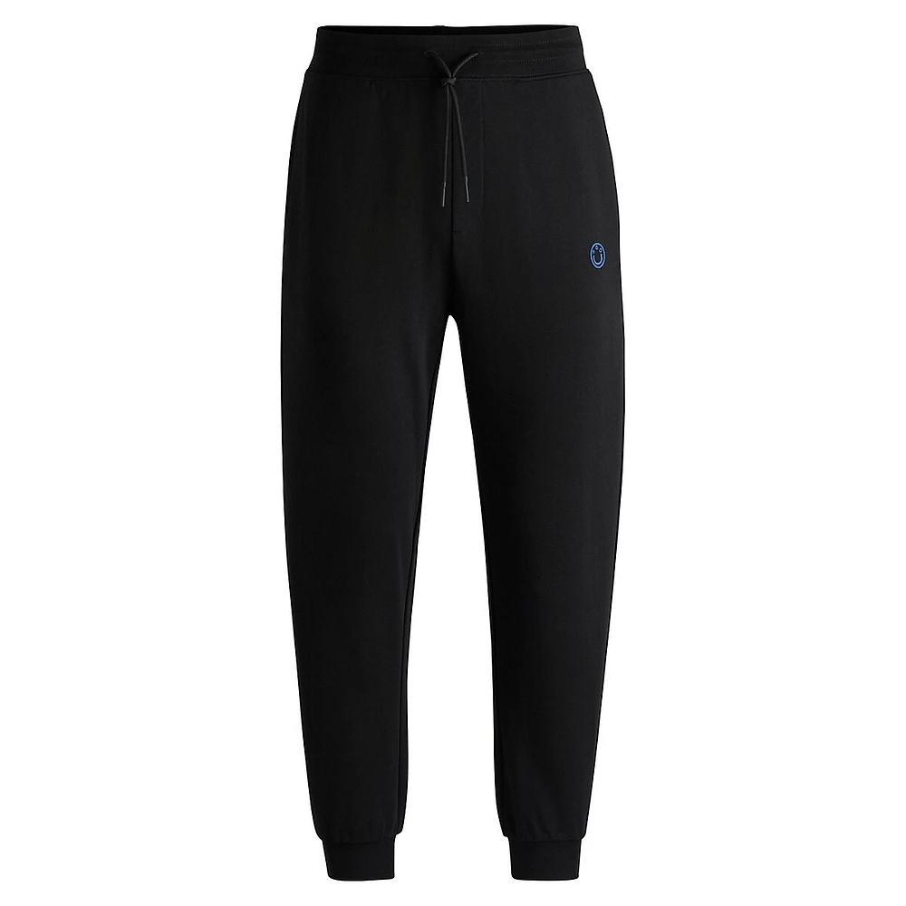 Cotton-Terry Track Pants With Smiley-Face Logo Patch