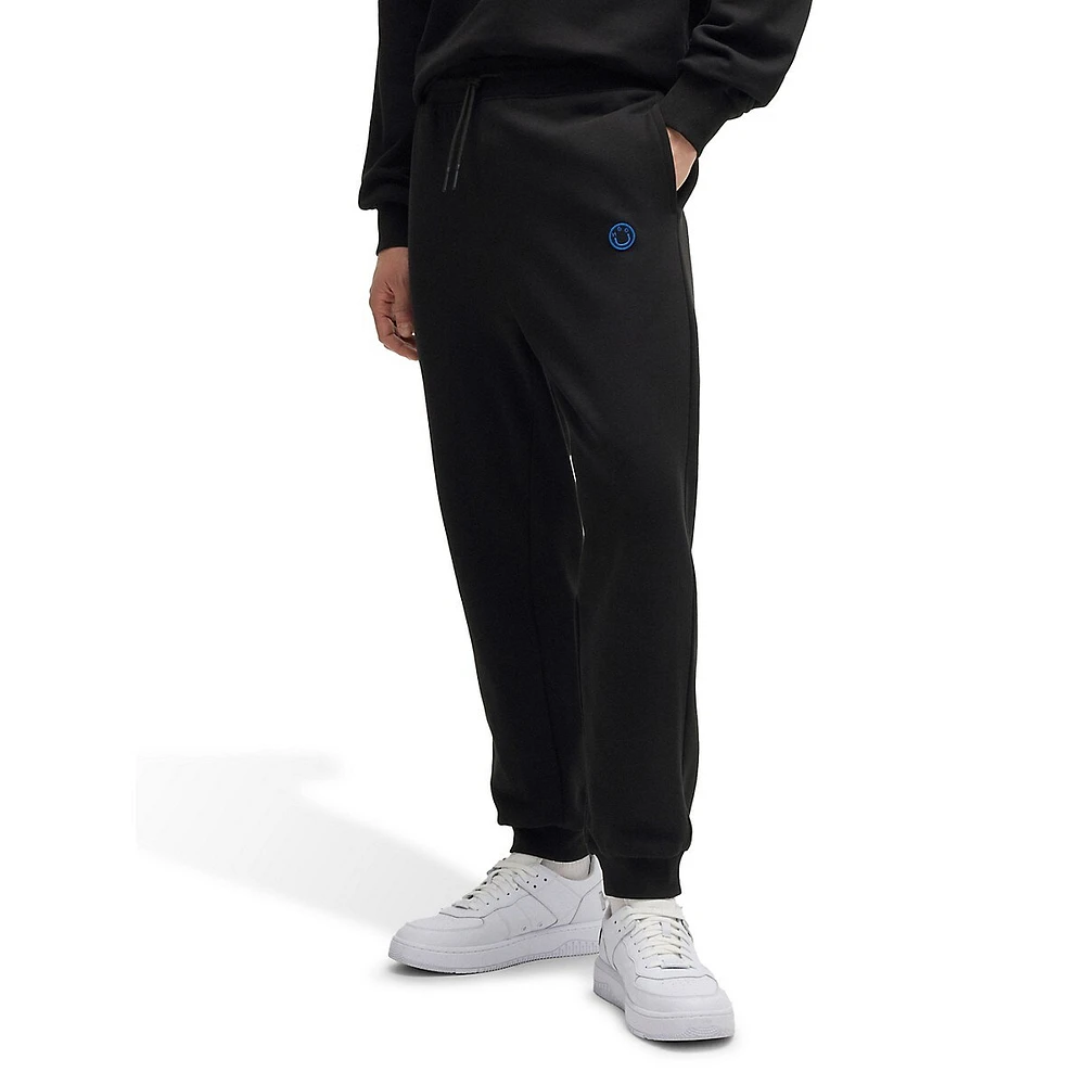 Cotton-Terry Track Pants With Smiley-Face Logo Patch