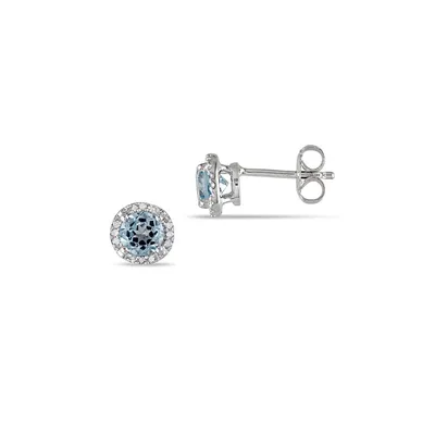 Dormeuses en argent sterling avec topaze bleue auréolée de diamants 0,07 ct PT