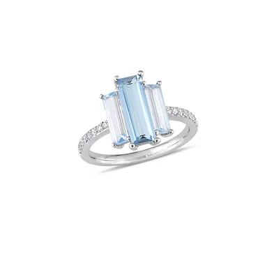 14K White Gold, Blue Topaz and 0.14 CT. T.W. Diamond Solitaire Ring