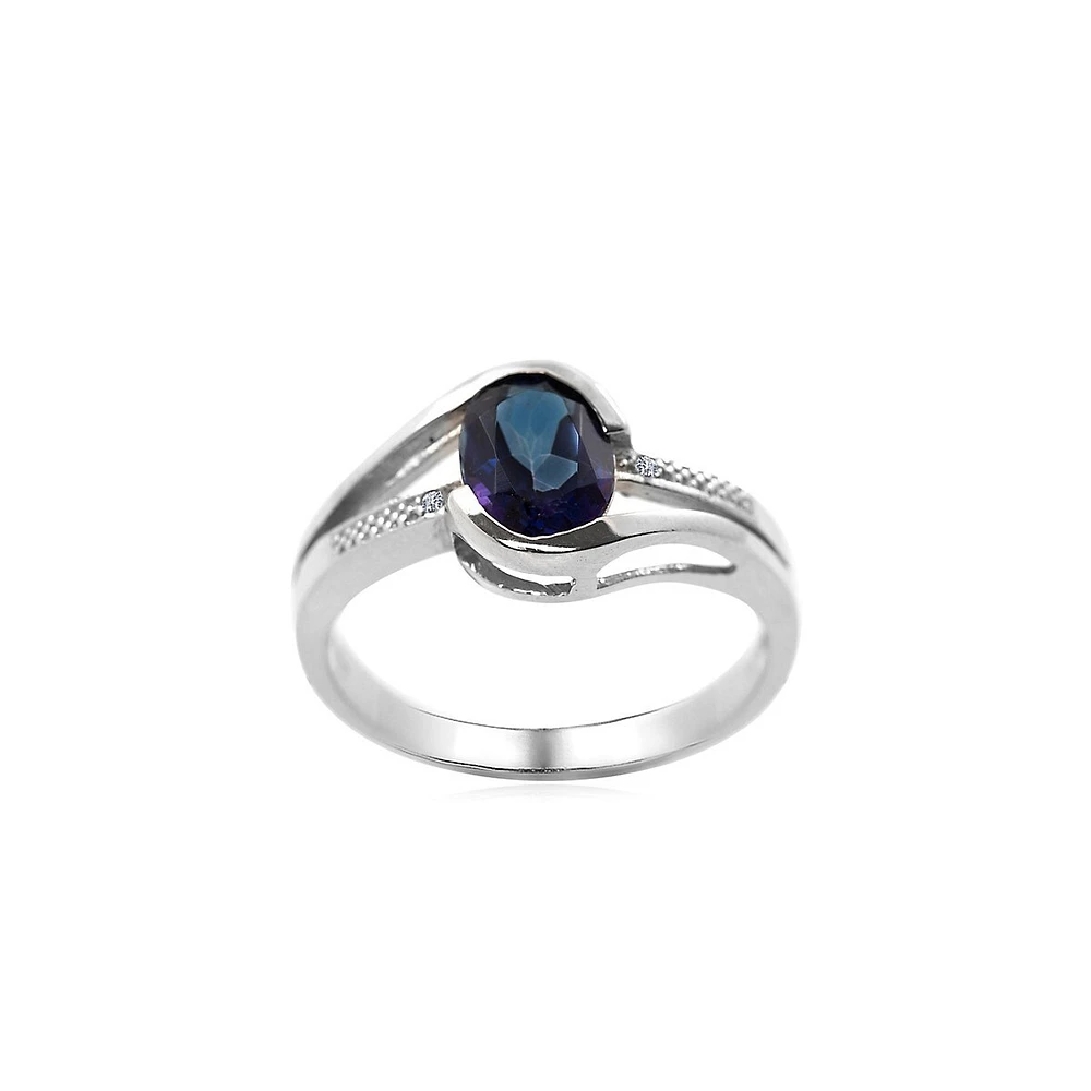 Bague en or blanc 10 ct avec topaze bleu paon et diamants 0,01 PT