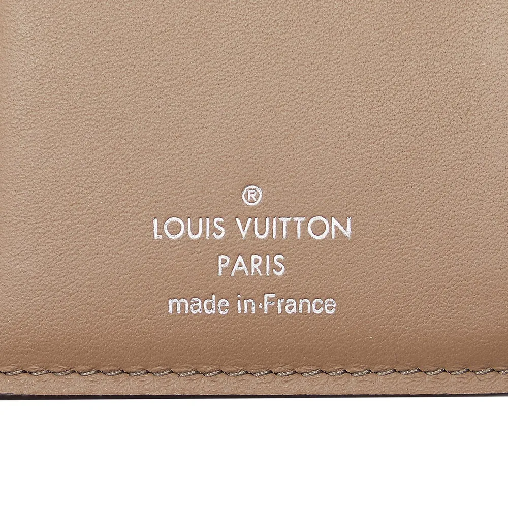 Pre-loved Taurillon Capucines Compact Wallet