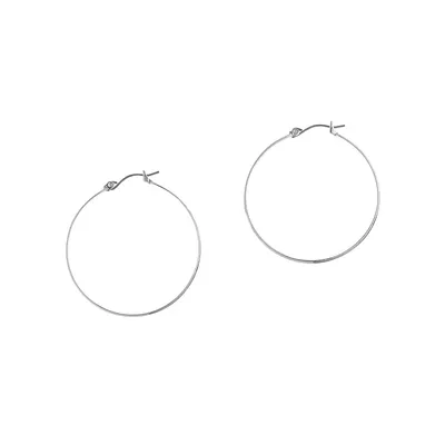 Basic large hoop earrings in silver tone metal.