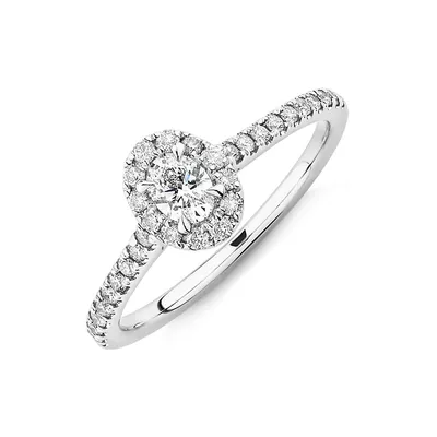 Oval Halo Ring With 0.50 Carat Tw Of Diamonds In 14kt White Gold