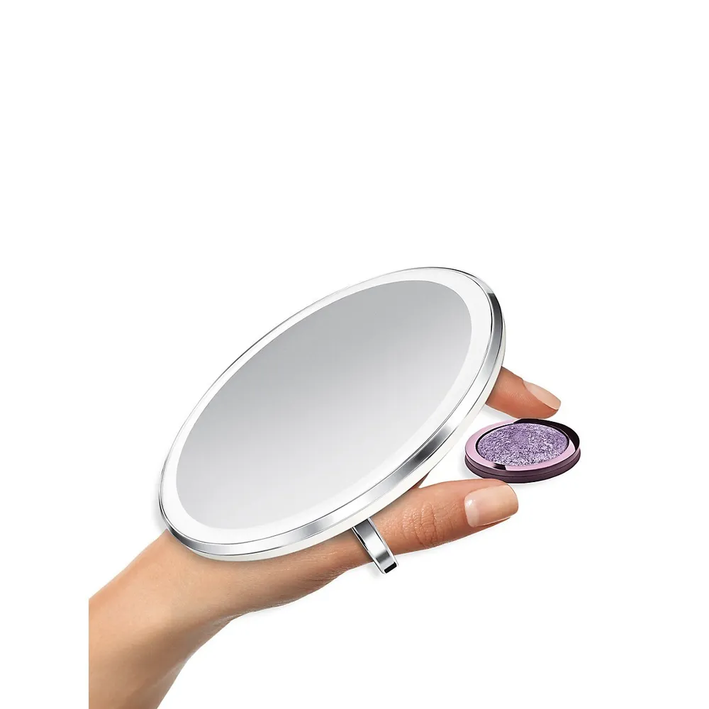 Miroir compact à détecteur de mouvement