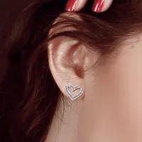 1/5 Ct Tw Diamond Heart Earrings In Sterling Silver