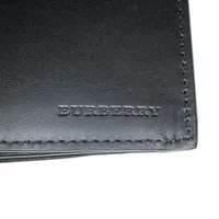 Pre-loved Embossed Leather Long Wallet