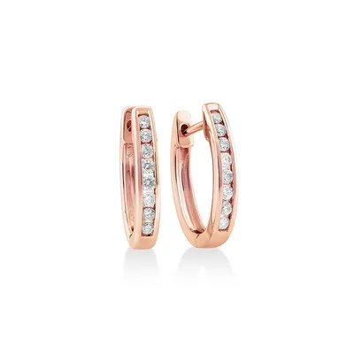 Huggie Earrings With 0.25 Carat Tw Of Diamonds In 10kt Rose Gold