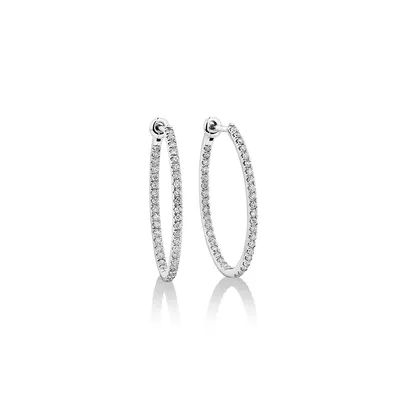 Oval Shape Hoop Earrings With 0.50ct Tw Of Diamonds In 10kt White Gold