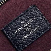 Pre-loved Louis Vuitton Freedom Satchel