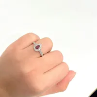 10k White Gold 0.32 Ct Ruby Gemstone & 0.50 Cttw Canadian Diamond Halo Style Ring