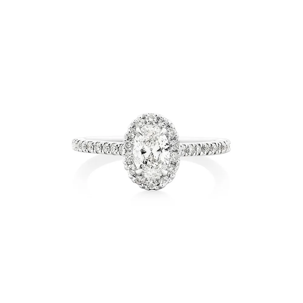 Halo Oval Engagement Ring With 0.92 Carat Tw Of Diamonds In 14kt White Gold