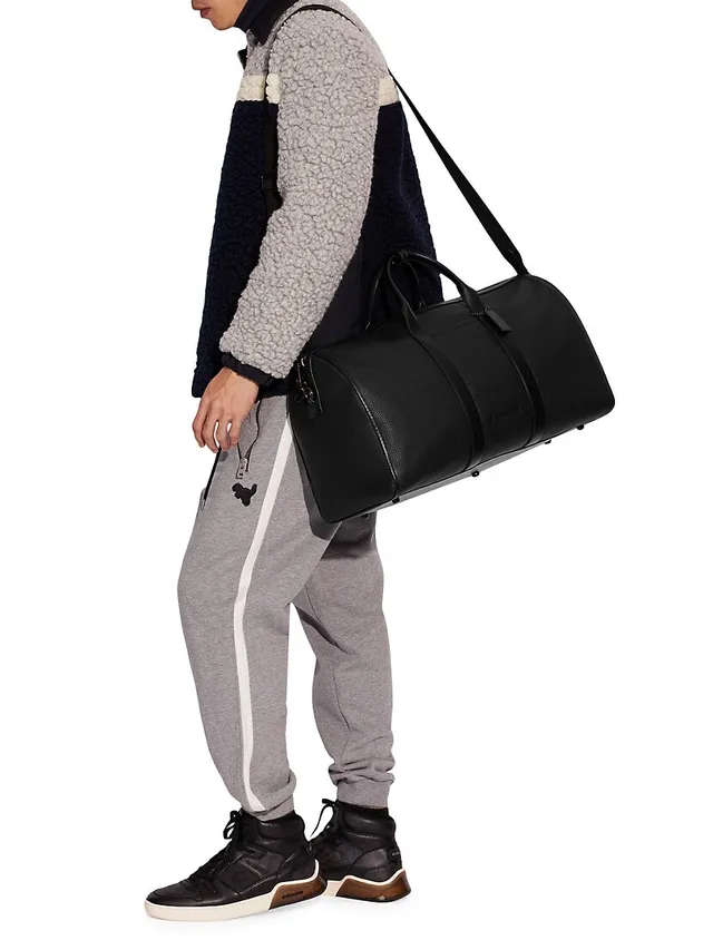 Sneakender Spiked Leather Duffel Bag in Black - Christian