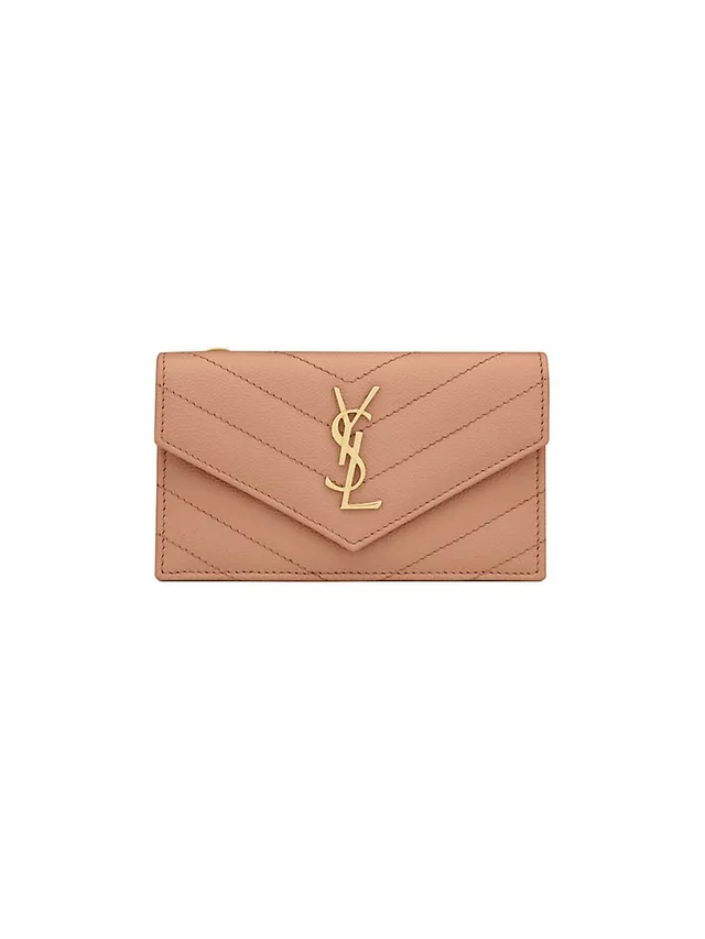 cassandre matelassé large zipped pouch in grain de poudre embossed leather