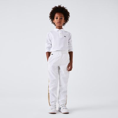 Polo regular fit à manches longues enfant Lacoste en petit piqué uni Taille 1 an Blanc