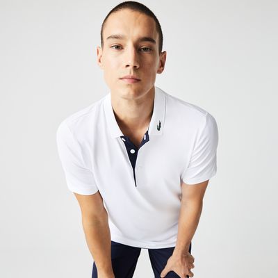 Polo homme Golf Lacoste Sport en jersey technique Taille Blanc/bleu Marine