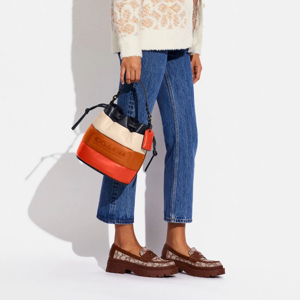 Field Bucket Bag With Colorblock Quilting And Coach Badge