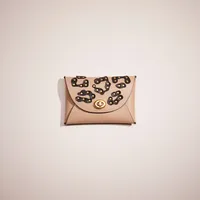 Remade Pouch With Exotic Animal Print Leather Applique