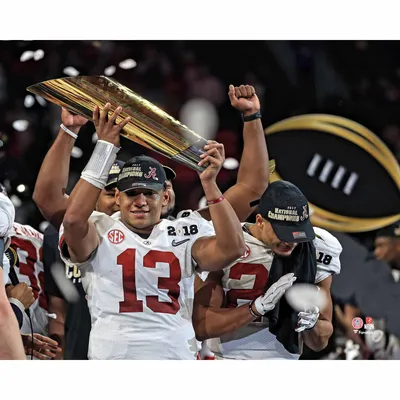 Lids Tua Tagovailoa Alabama Crimson Tide Fanatics Authentic Unsigned White  Jersey Raising Up National Championship Trophy Photograph