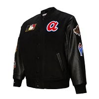 Veste universitaire à boutons-pression complète Mitchell & Ness pour homme des Atlanta Braves Blackout Collection