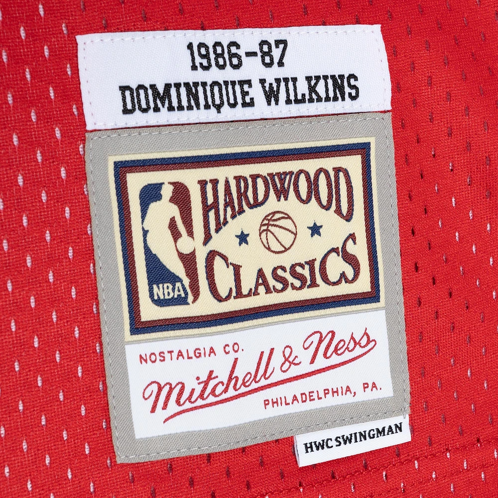 Maillot Swingman divisé Mitchell & Ness Dominique Wilkins pour hommes jaune/rouge Atlanta Hawks Hardwood Classics 1986/87