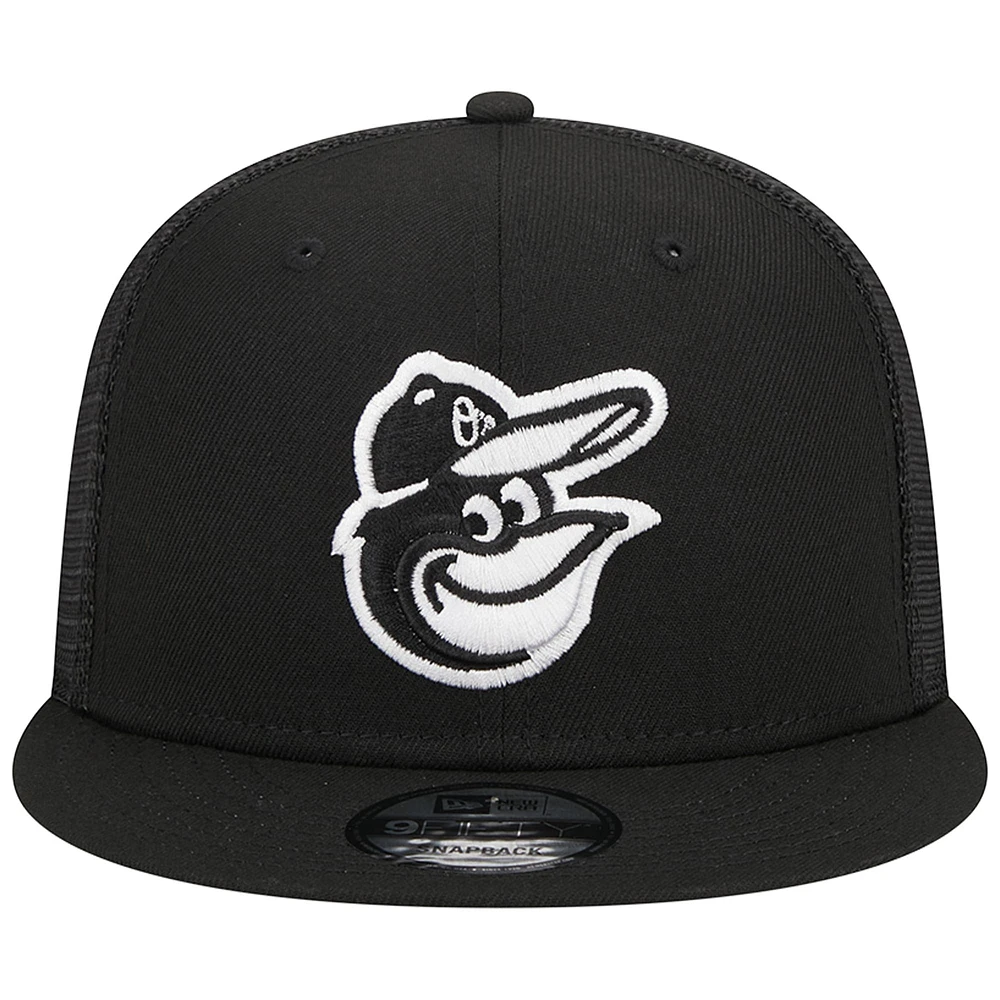 Men's New Era Black Baltimore Orioles Trucker 9FIFTY Snapback Hat