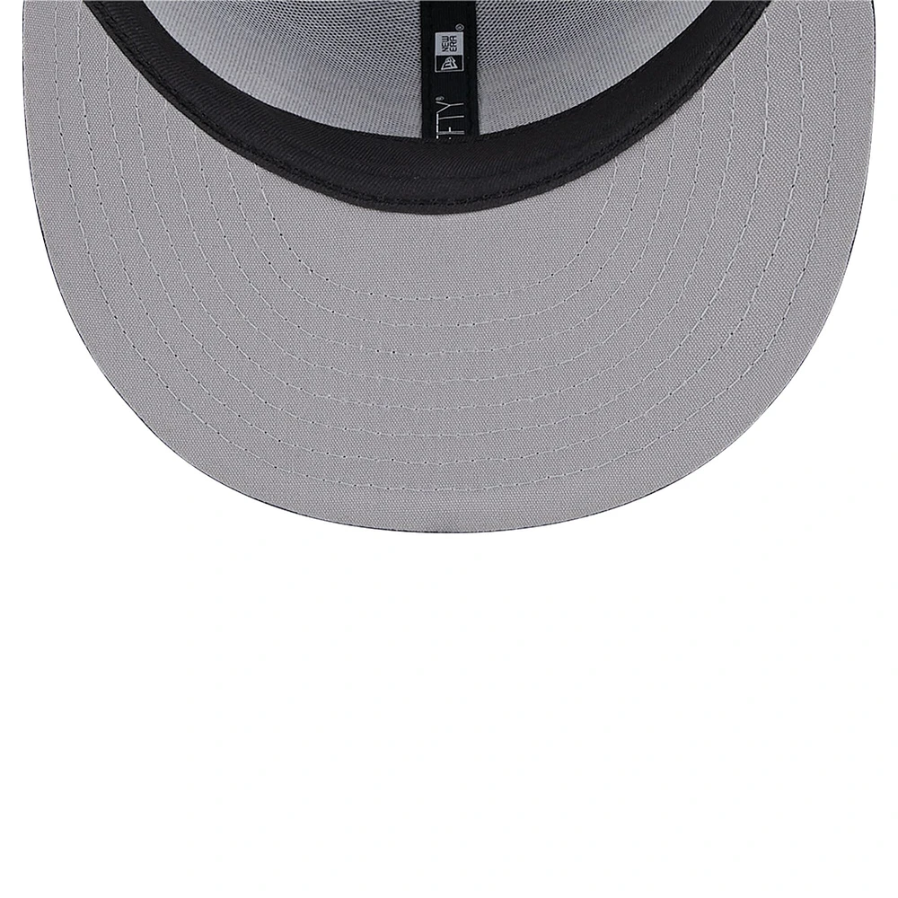 Men's New Era Black Baltimore Ravens Main Trucker 9FIFTY Snapback Hat