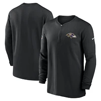 Haut Nike noir Baltimore Ravens 2023 Sideline Performance à manches longues tri-mélange et quart de zip pour homme