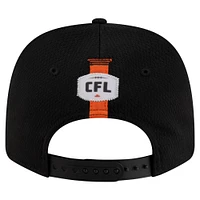 Casquette extensible noire à boutons-pression New Era BC Lions Sideline 9SEVENTY pour homme