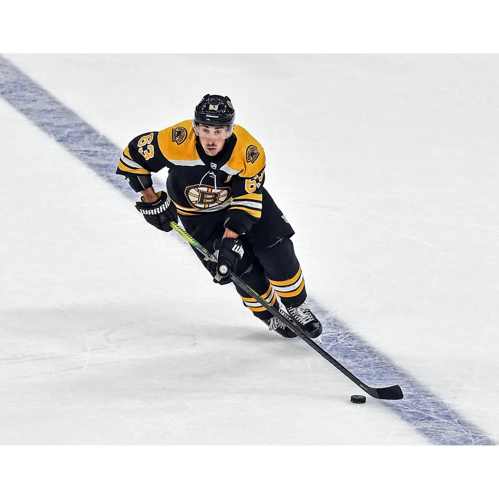Brad Marchand Boston Bruins Unsigned White Jersey Skating Photograph