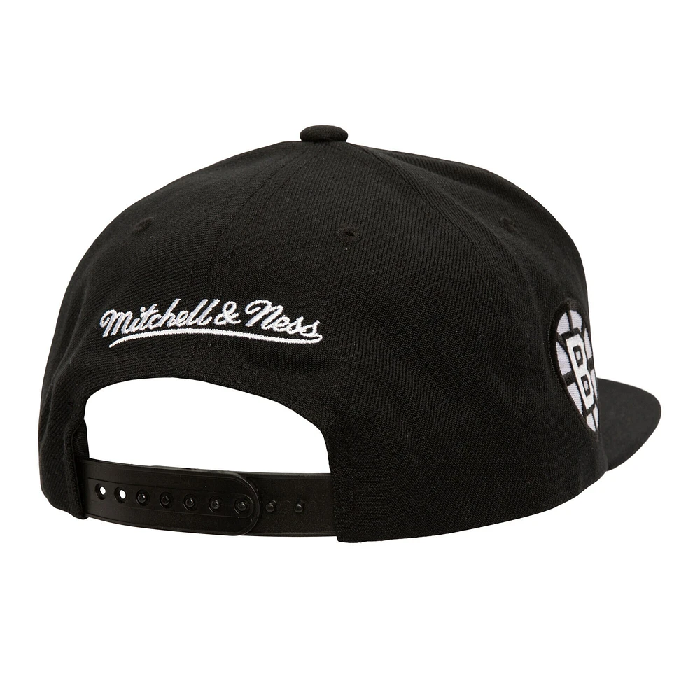 Casquette snapback noire pour homme des Bruins de Boston de Mitchell & Ness